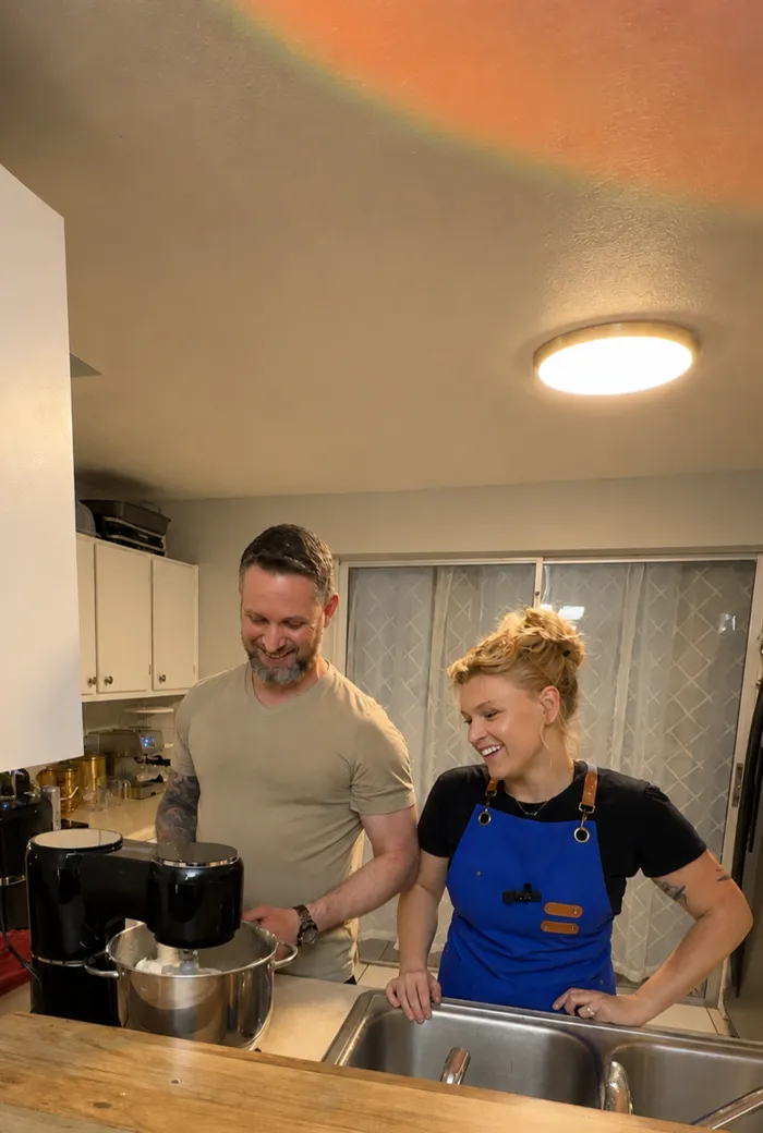 Mary and Thiago mixing up a fresh batch of pão de queijo